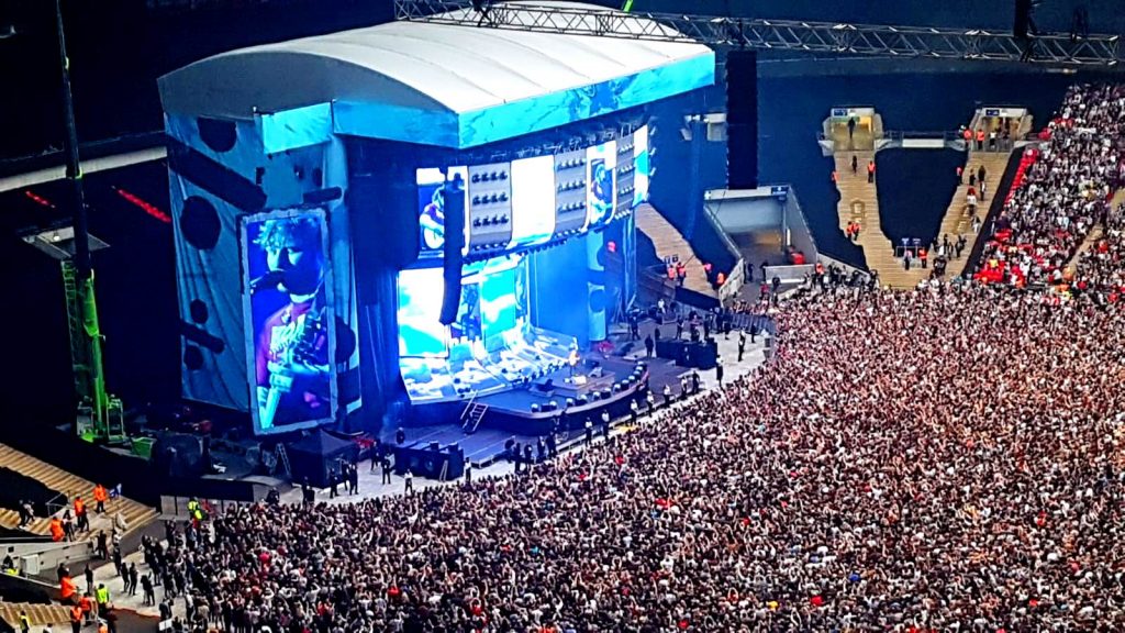 Ed Sheeran Live at Wembley Stadium, stage lit up at Wembley Stadium, Wembley Stadium Concert, Ed Sheeren Divide Tour, Ed Sheeren in Concert, crowds at Wembley Stadium